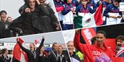 Groups of teams celebrating with their respective countries flags