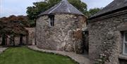 a traditional irish home made of stone