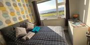 View with binoculars King Room