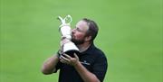 Shane Lowry kissing the Claret Jug after winning The Open 2019