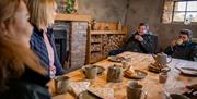 Visitors enjoy locally sourced refreshments during the Sheep Farm experience