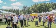 People Shopping at Benone Artisan Market