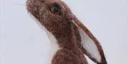 a wool-felted hare