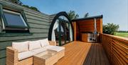 Decking with outdoor sofa and hot tub