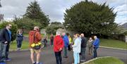 A tour group at Christchurch graveyard