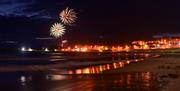 Fireworks light up the sky above Ramore Head