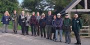 a group of people all lined up to participate in the red squirrel walk