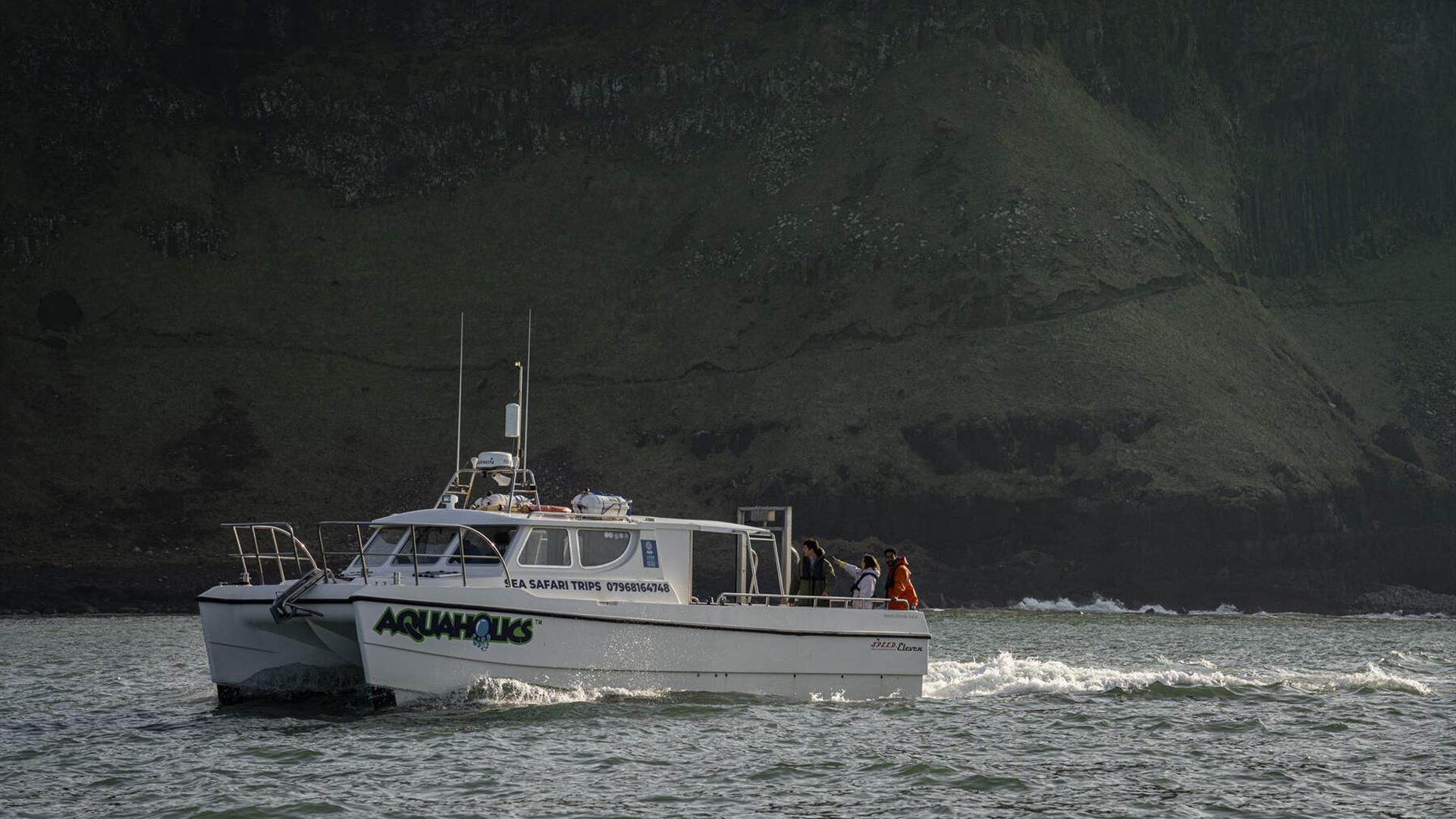 image of Aquaholics boat at sea image of Aquaholics boat at sea