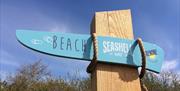 Benone Beach signage
