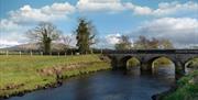 Stone bridge with arch ways over the River Roe
