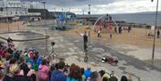 A crowd watches the entertainment at The Crescent in Portstewart