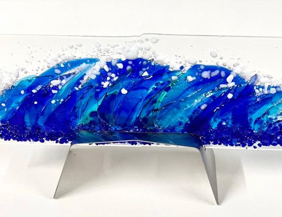 Image of a fused glass wave sculpture to inspire workshop participants