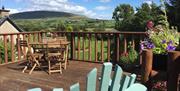 View of Knocklayde and al fresco dining area.