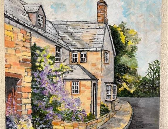 Painting of a stone cottage with flowers ourtside