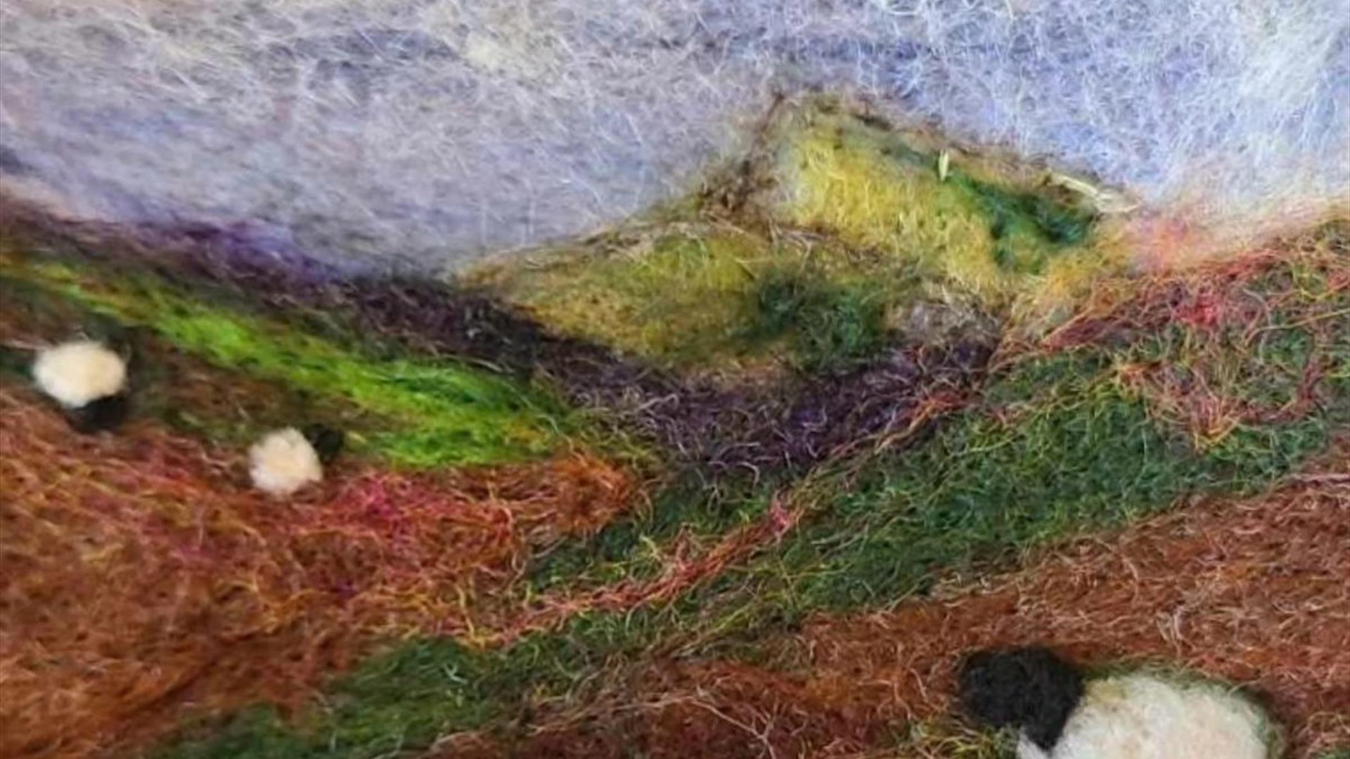a depiction of a landscape with sheep made from felt a depiction of a landscape with sheep made from felt