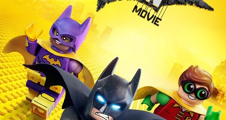 Lego Batman movie poster showing three Lego figures running