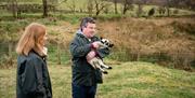 Visitors can pick up lambs and give them a cuddle at Dunfin Sheep Farm