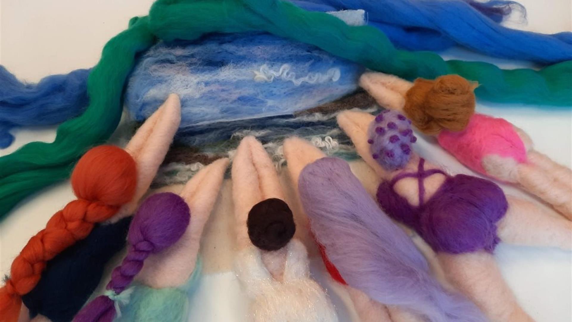 a selection of sea swimmer figurines crafted using a felting technique a selection of sea swimmer figurines crafted using a felting technique