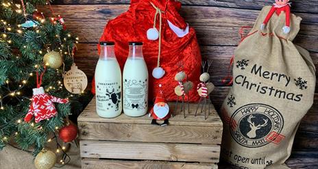 Christmas tree, milk bottles, santa and reindeers.