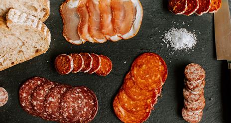 a selection of cured meats