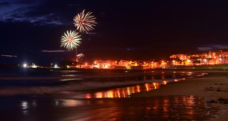 Fireworks light up the sky above Ramore Head