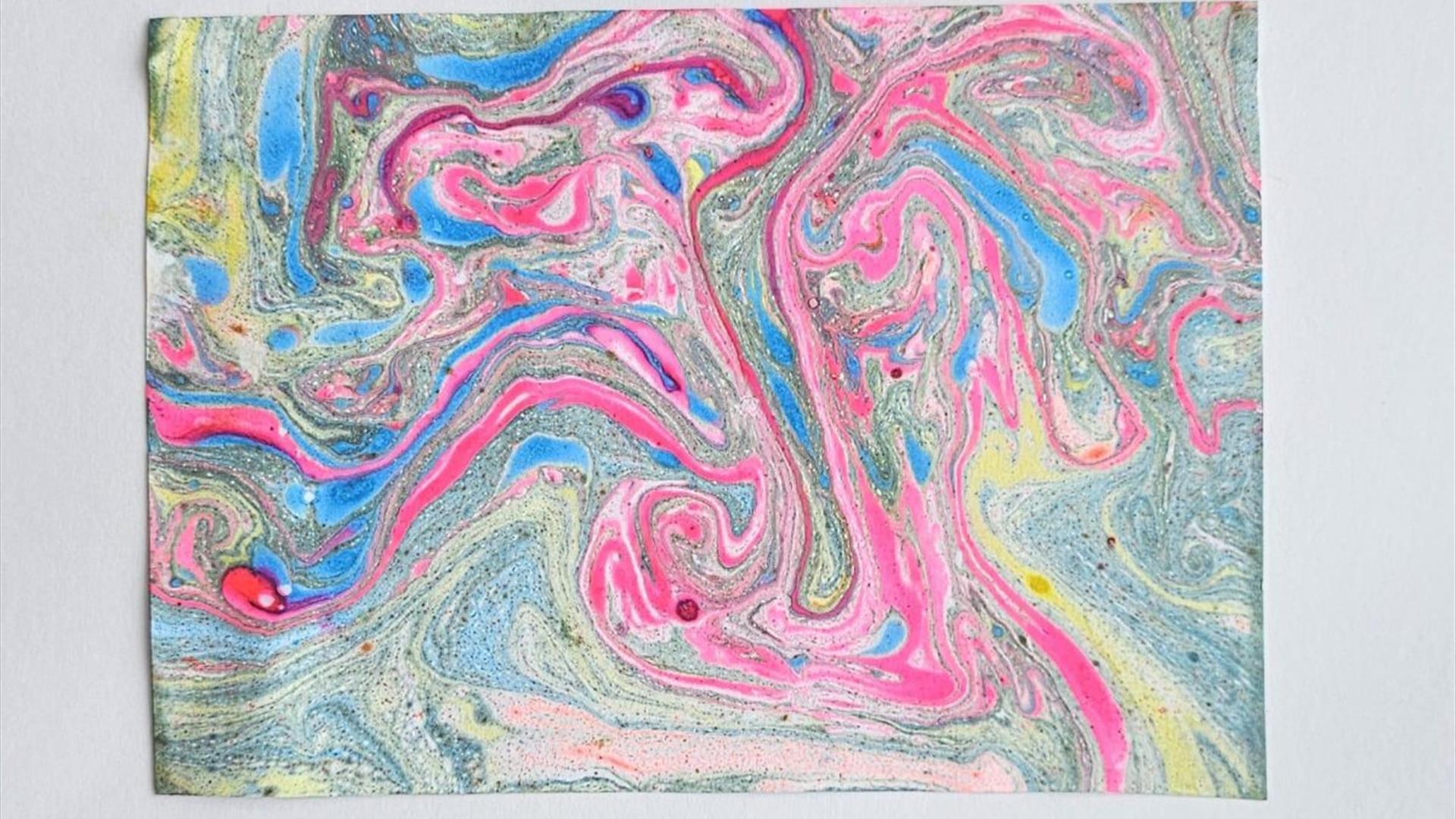 a print of many different bright colours all mixed and marbled together a print of many different bright colours all mixed and marbled together