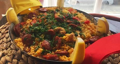 a freshly cooked dish of traditonal Spanish paella