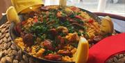 a freshly cooked dish of traditonal Spanish paella
