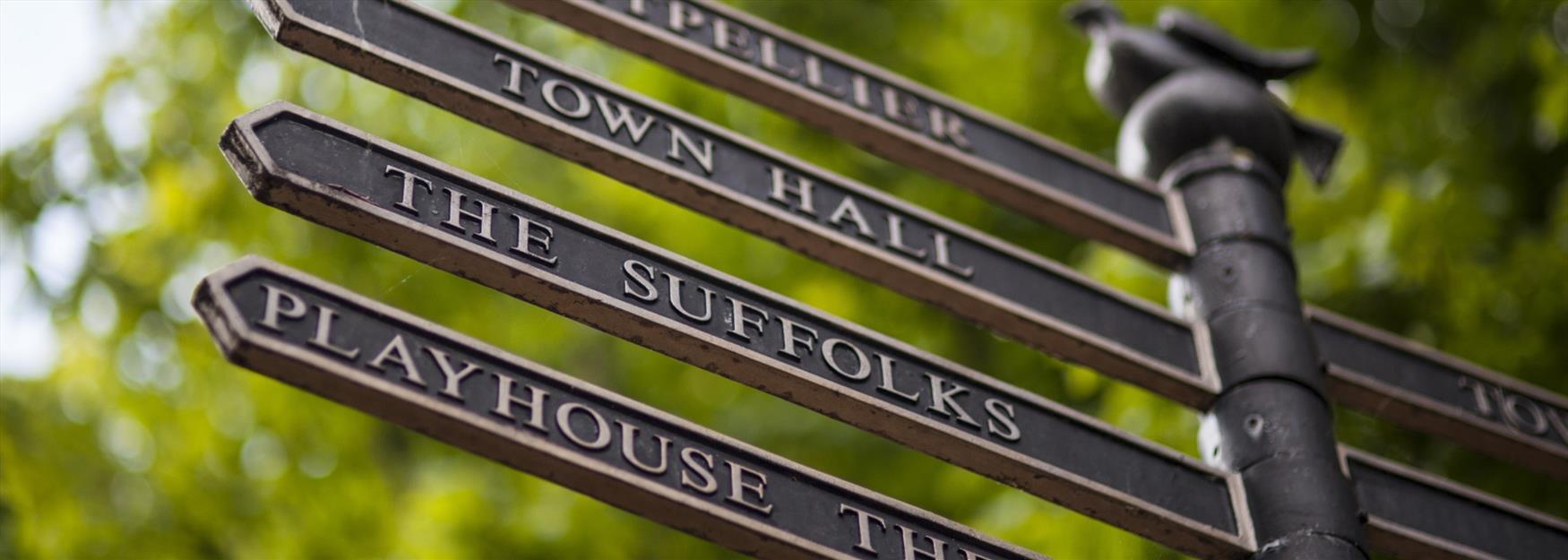 Close up of finger post directional sign in Cheltenham