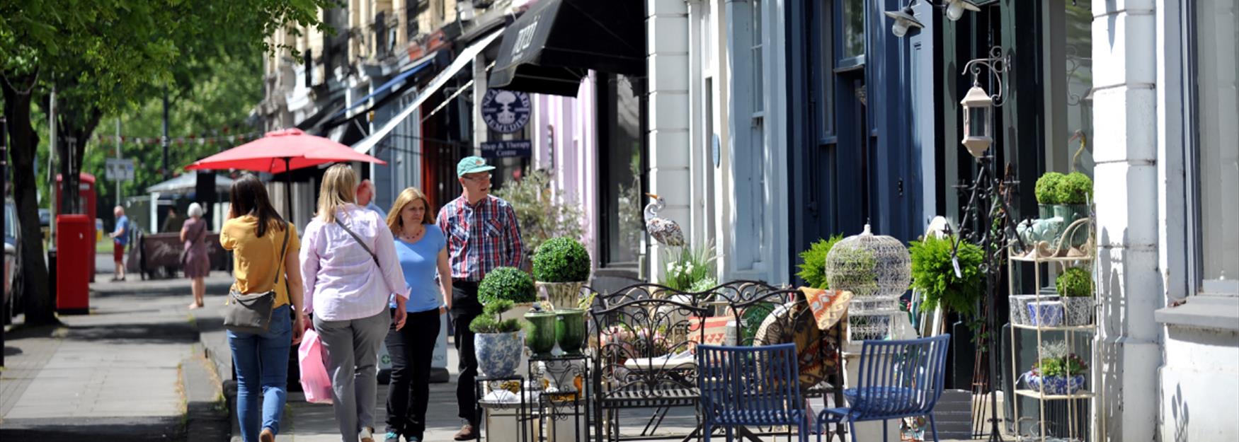 People browsing some of Cheltenham's many independent and boutique shops