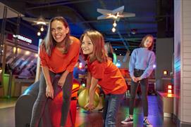 Family enjoying bowling