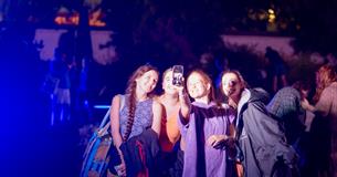 Visitors at the lido at night.