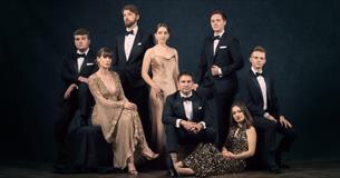 Vocal ensemble VOCES8 posing in black tie attire
