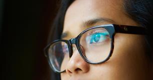 Women wearing a pair of glasses