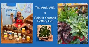 Becky holding fired pots and array of houseplants