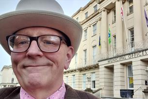 Alan Jones in front of Cheltenham Municipal Offices