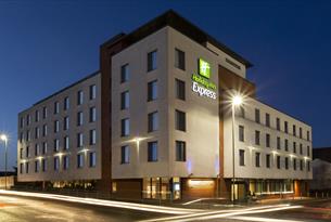 Exterior of Holiday Inn Express in the evening