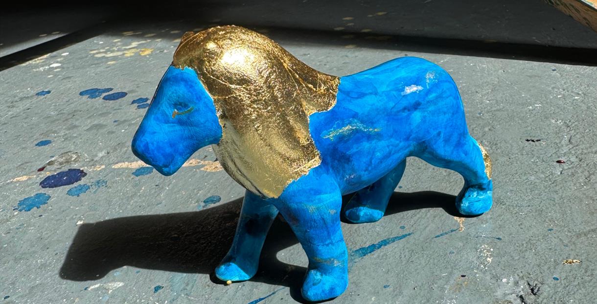 Lions at Large painted sculpture