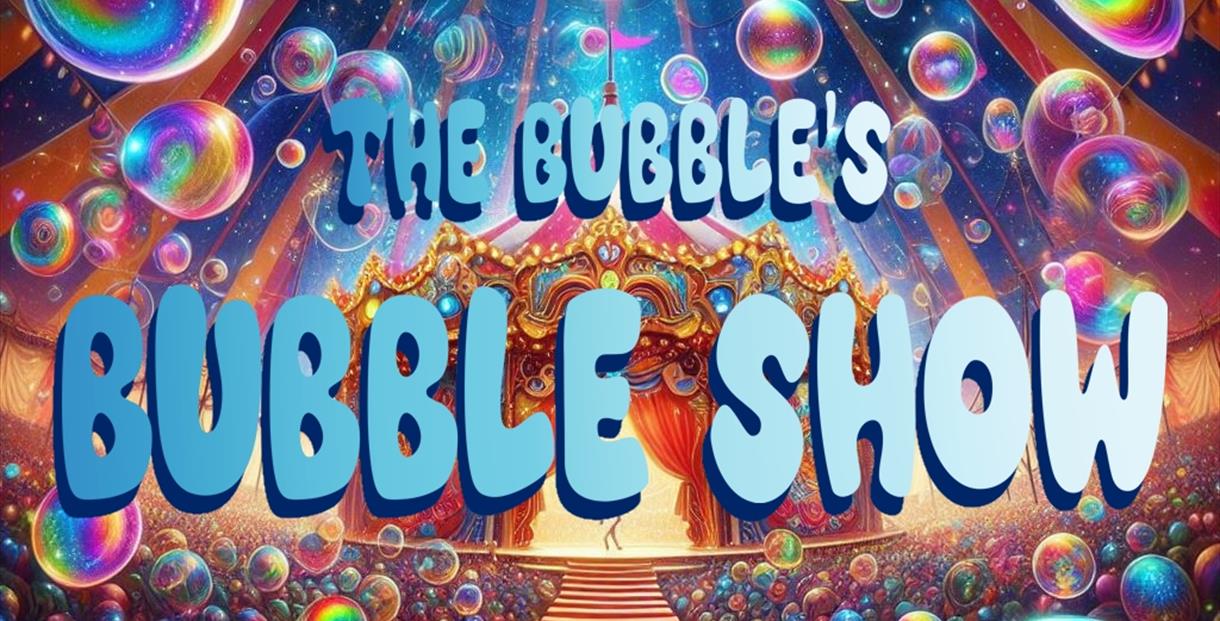 A colourful picture of bubbles amongst a theatre tent