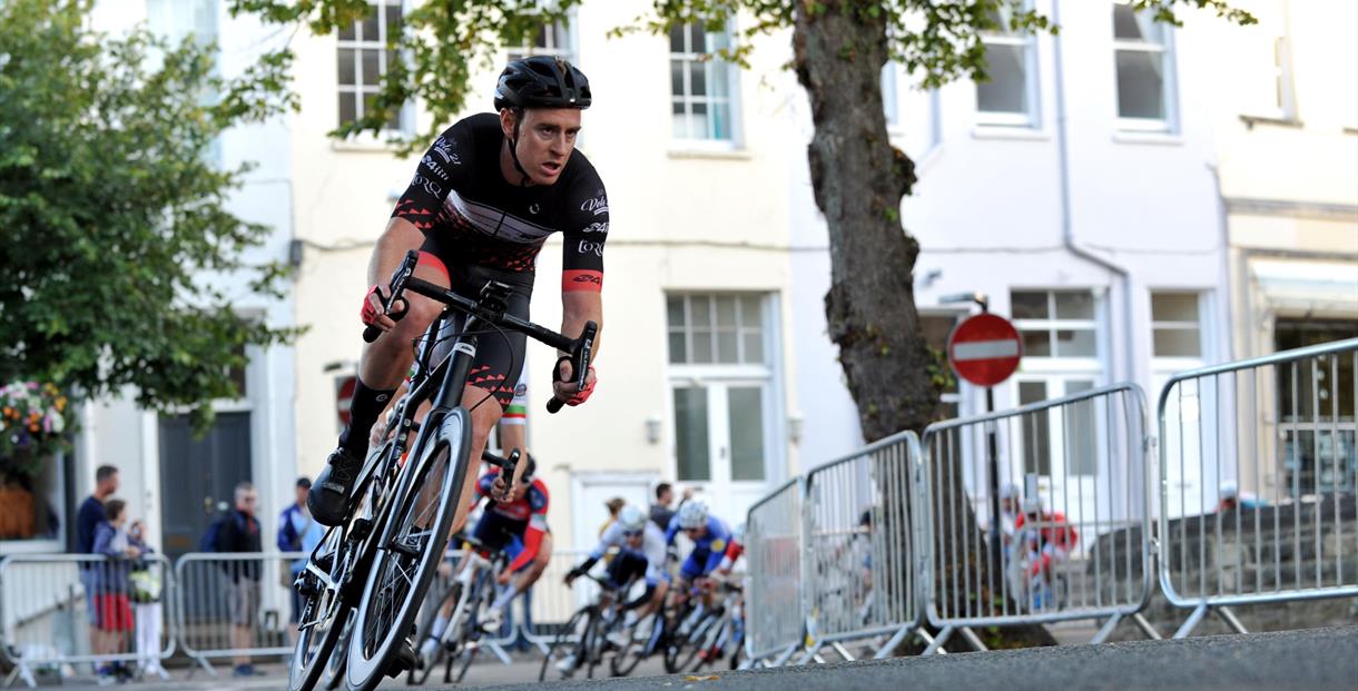 A man riding a bike in Cheltenham