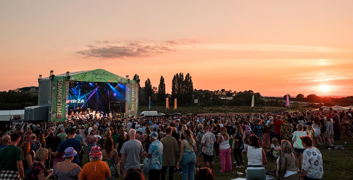 A sunset and stage at Cheltenham Racecourse