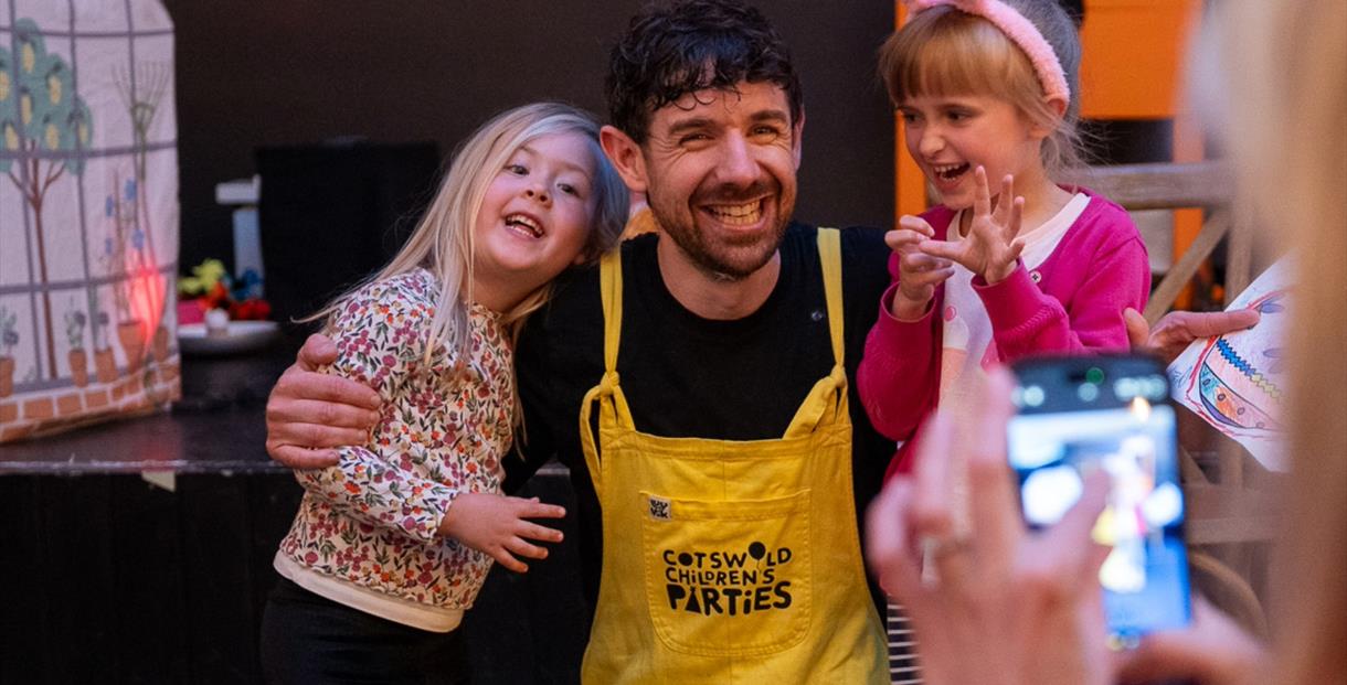 Children next to Phil