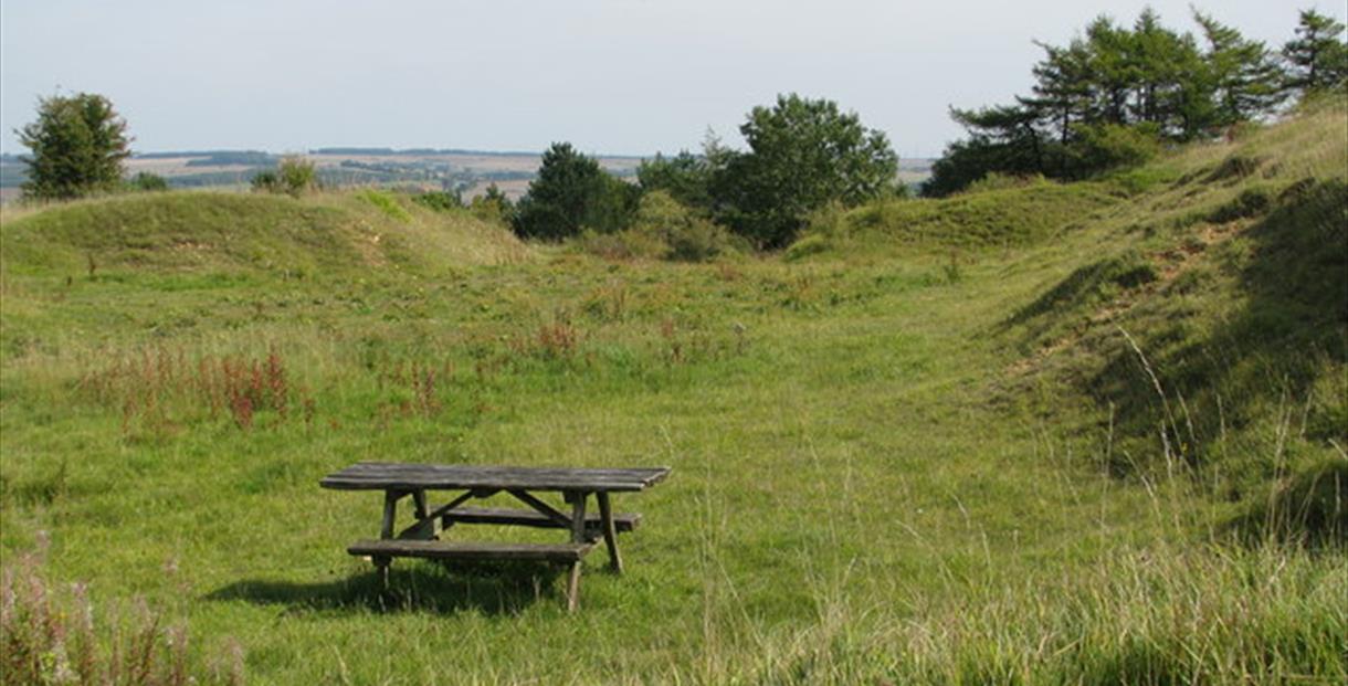 Picnic bench on a hill