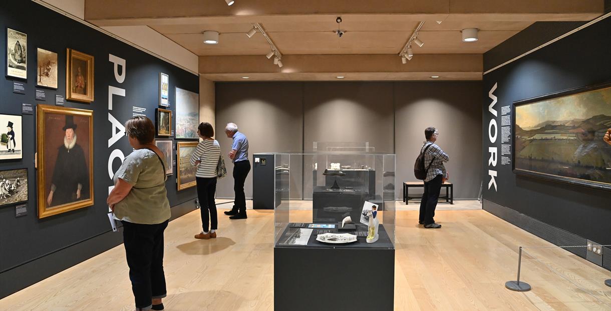 Patrons enjoying the Wilson Art Gallery displays