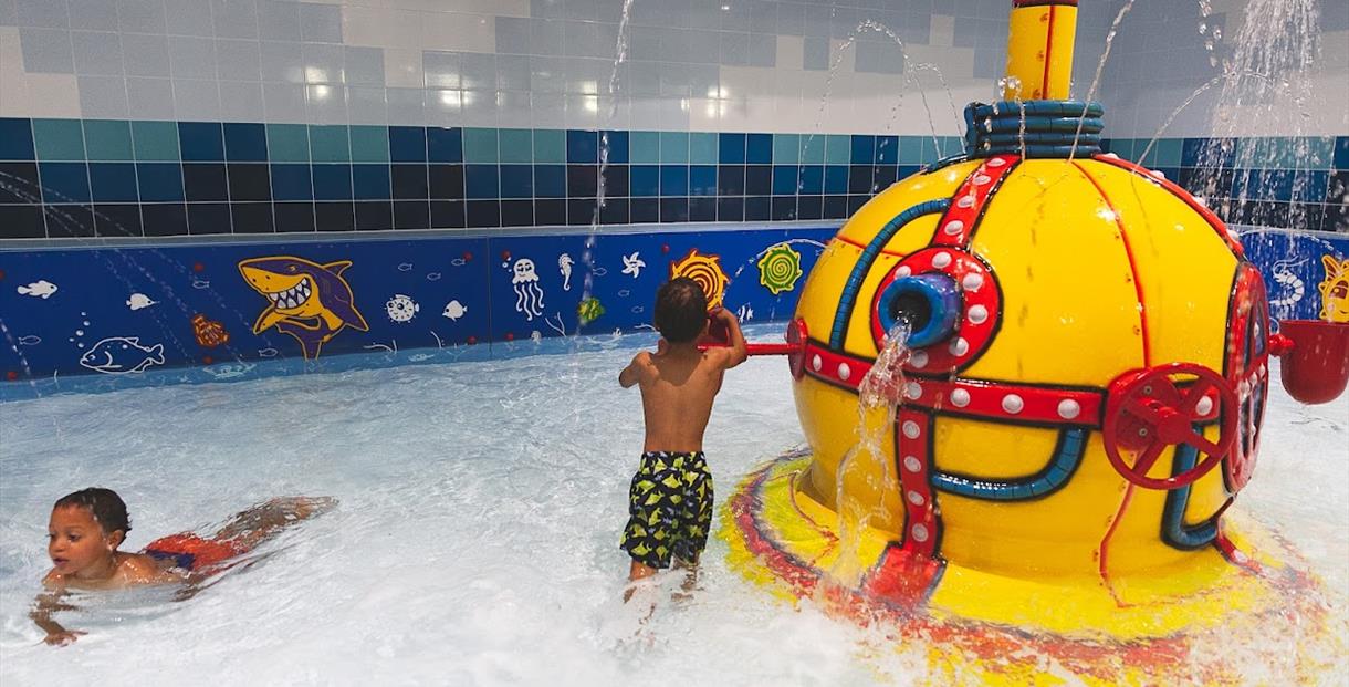 Children playing at the Splash Pad