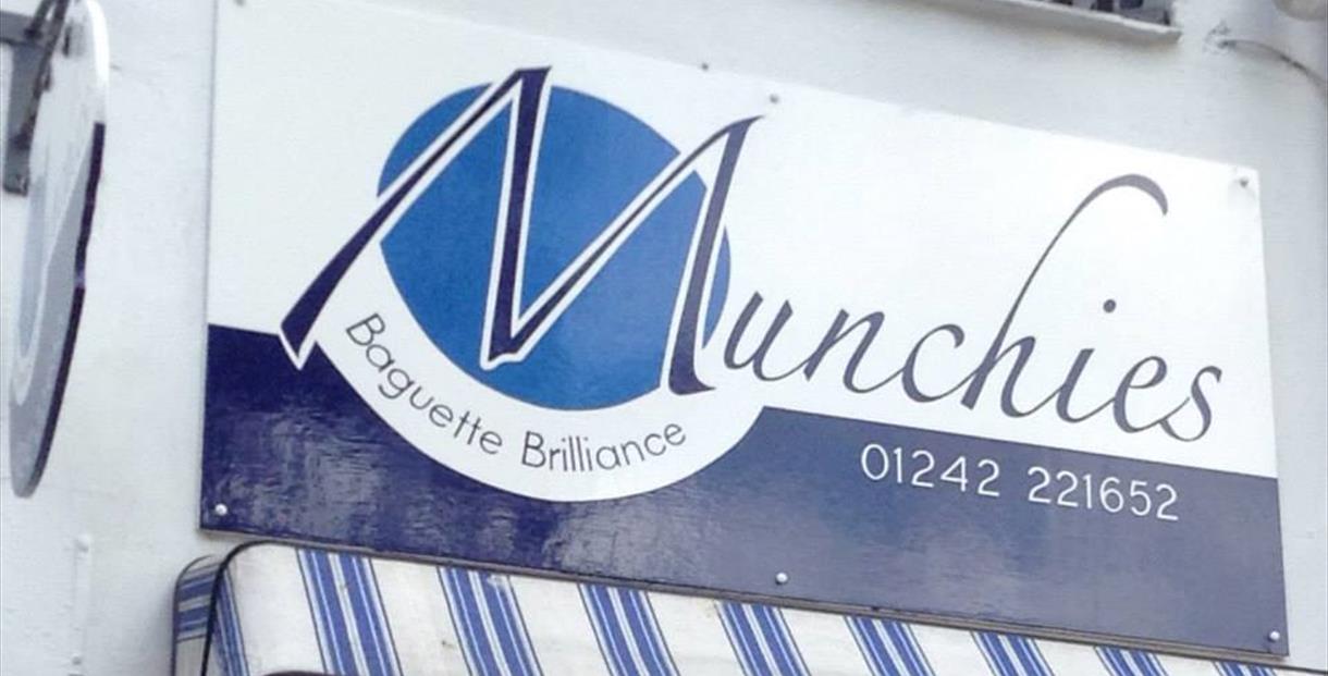 Munchies shopfront showing the blue and white Munchies logo