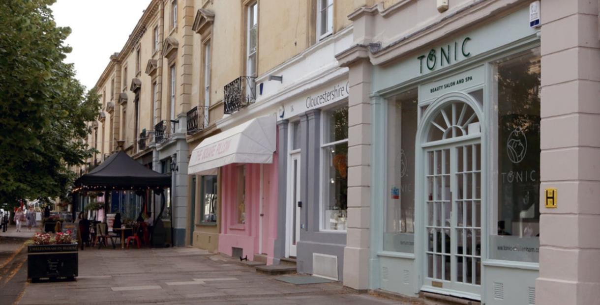 The Tonic salon traditional style shopfront in pale green painted wood.