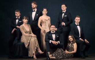 Vocal ensemble VOCES8 posing in black tie attire