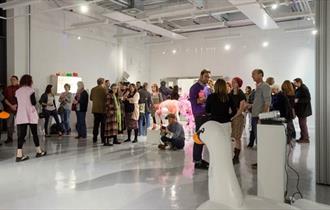 Visitors exploring the gallery