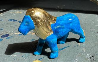 Lions at Large painted sculpture